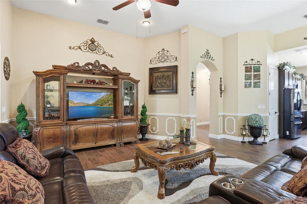 13429 Montevista Road Clermont, FL 34711 - Photo 27 of 89 a living room with furniture
