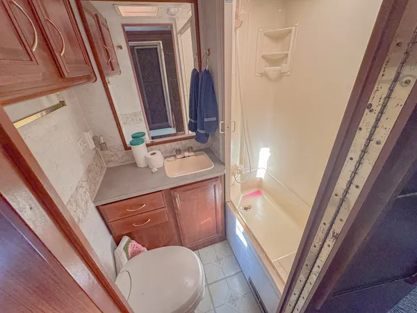 a view of living room with furniture and a fireplace