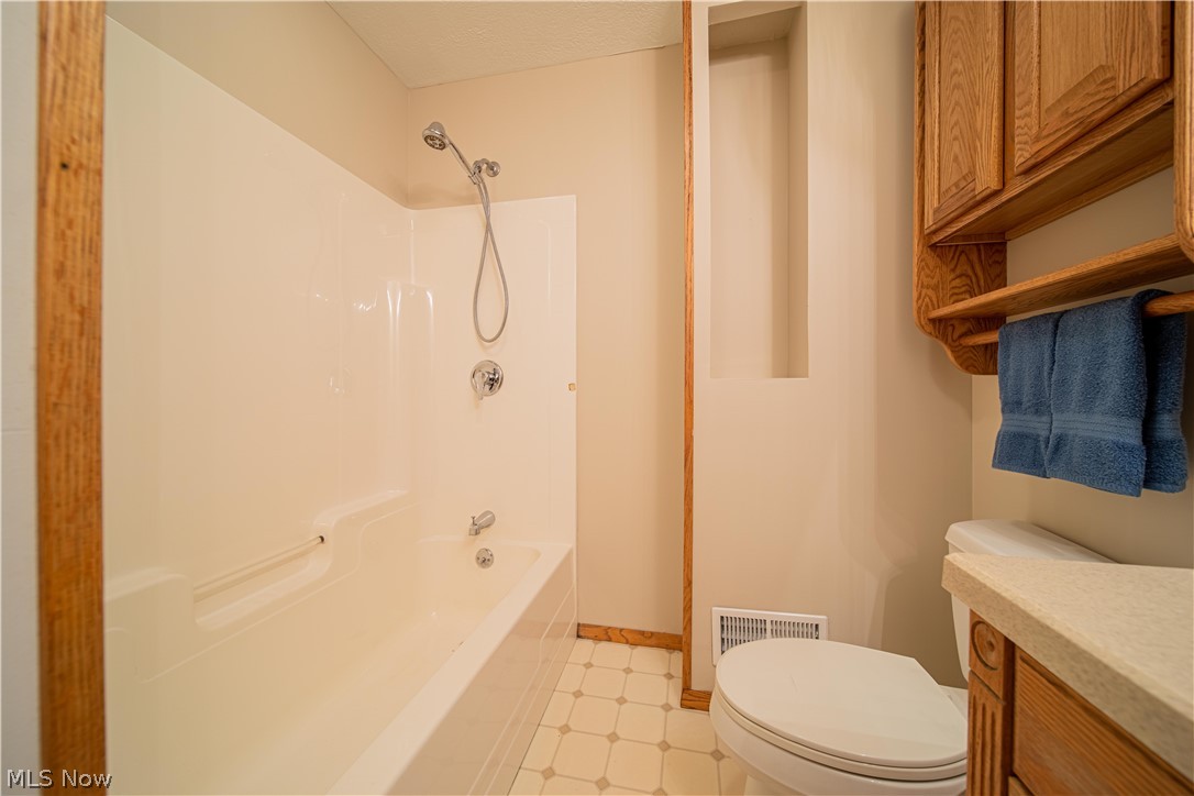 4639 Webb Road Perry, OH 44081 - Photo 11 of 34 Tub /Shower combination. This main floor bathroom is across from 2 main floor bedrooms. How convenient!