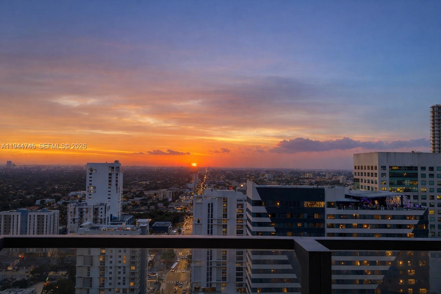 88 Southwest 7th Street, Unit 2302 Miami, FL 33130 - Photo 2 of 43 a view of a city from a balcony