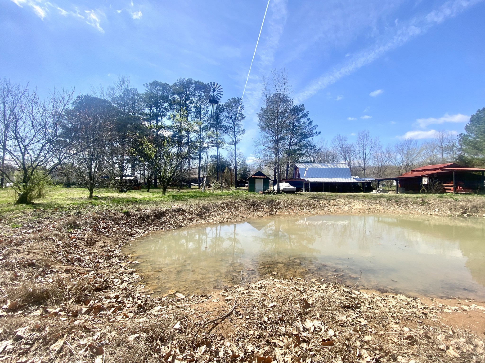 200 Brown Town Road Waverly, TN 37185 - Photo 17 of 27 a view of a lake with a yard
