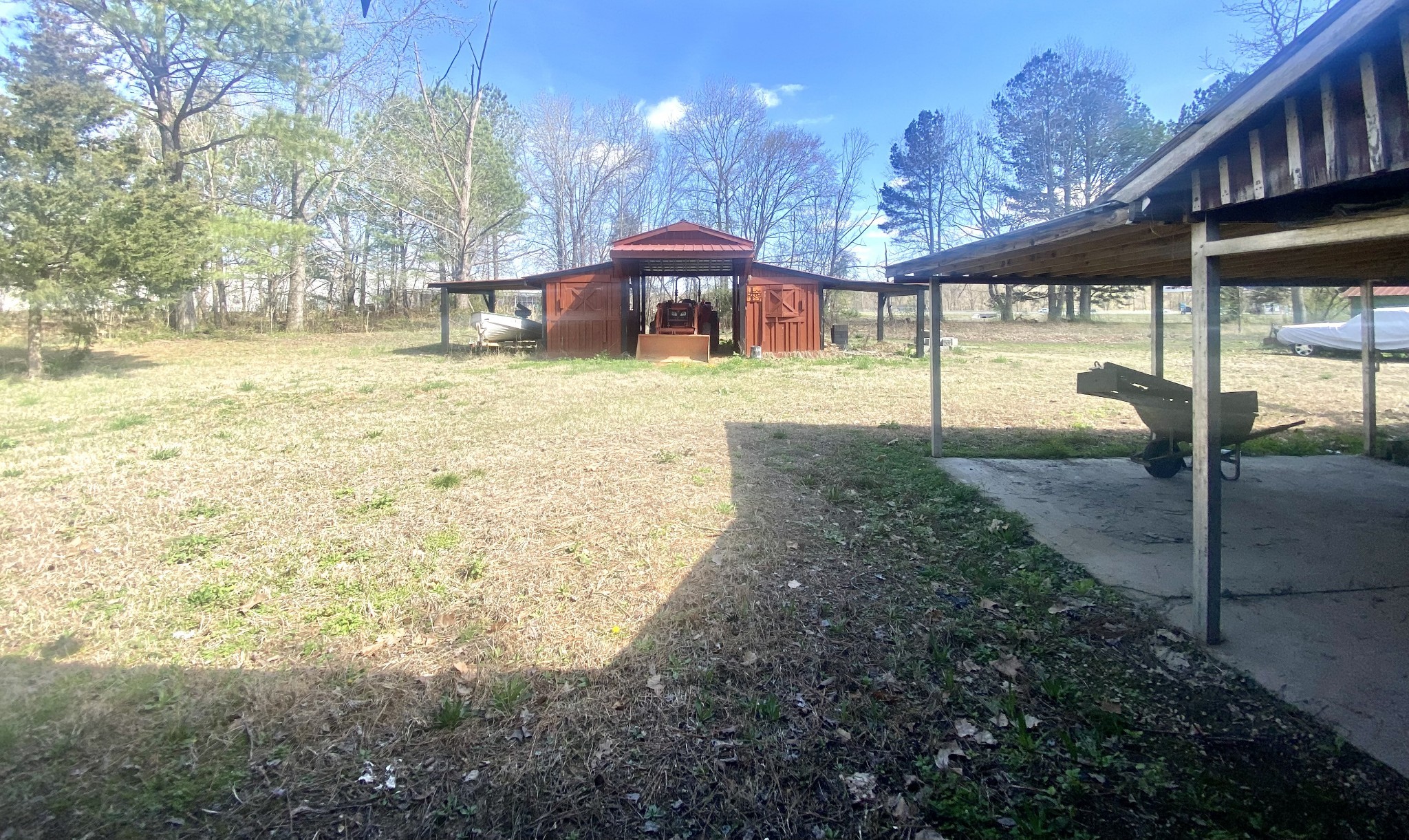 200 Brown Town Road Waverly, TN 37185 - Photo 22 of 27 a front view of a building with a yard