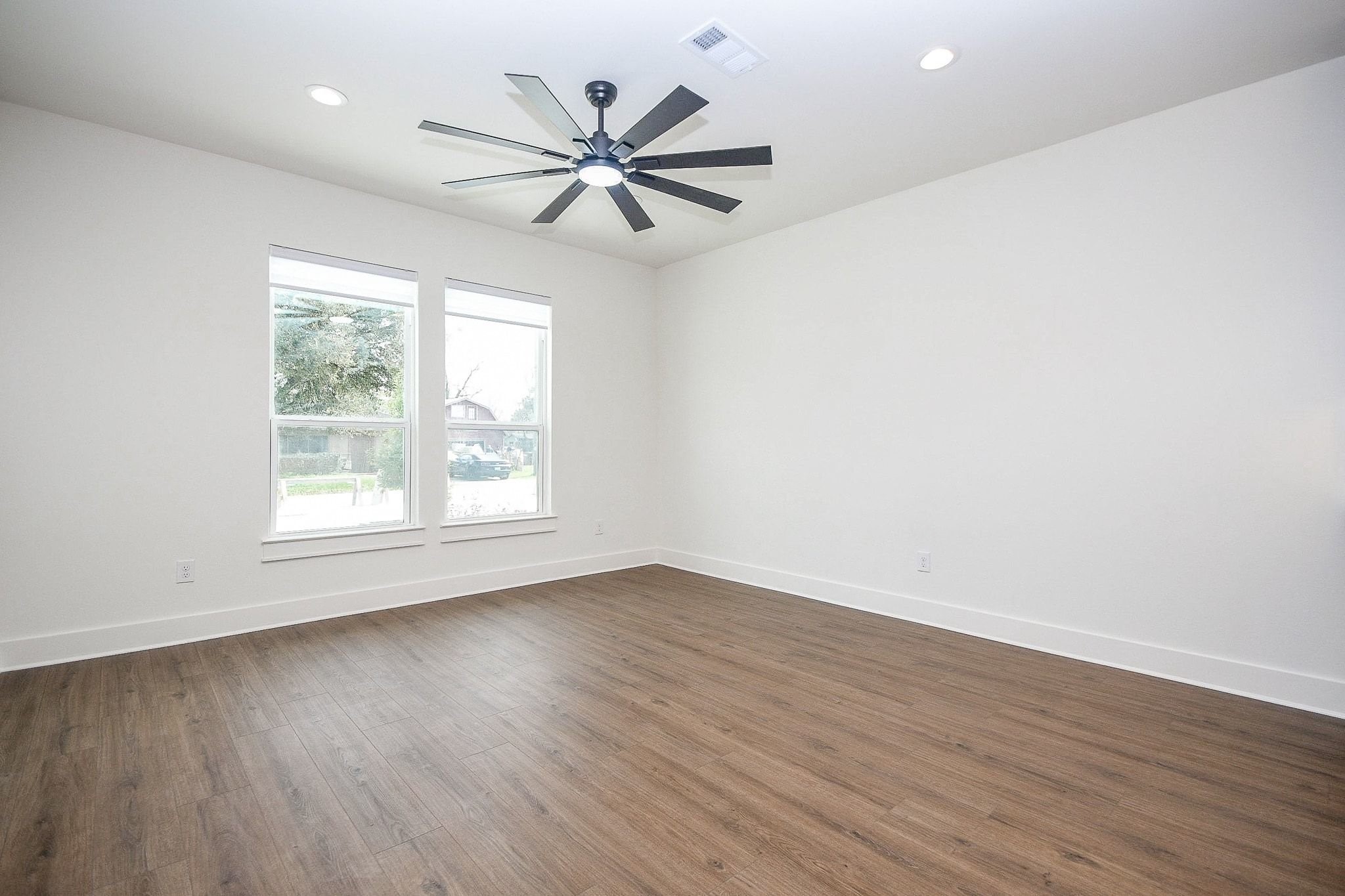 4101 Victoria, Unit B Dickinson, TX 77539 - Photo 5 of 33 a view of a big room with wooden floor and windows
