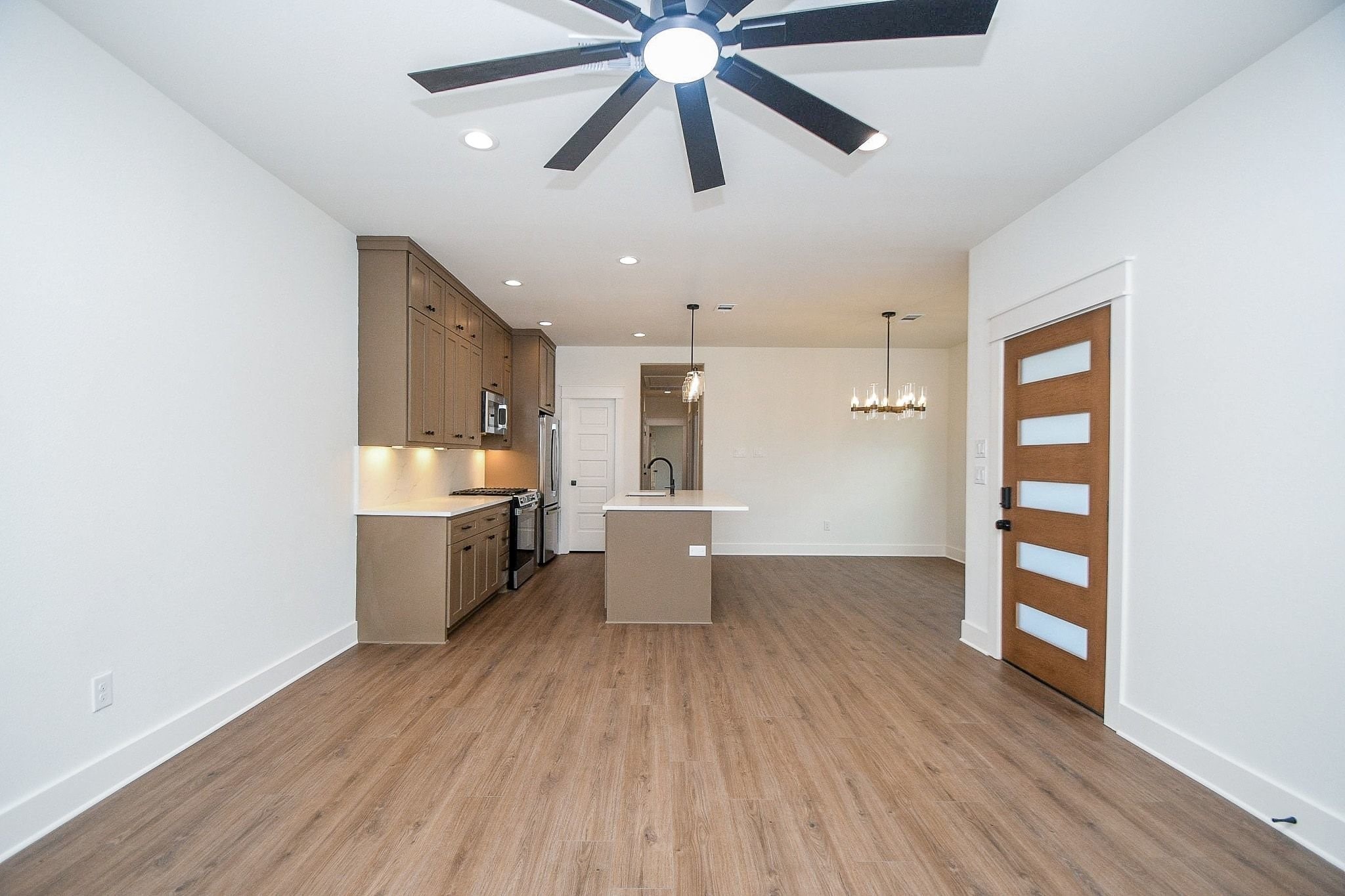 4101 Victoria, Unit B Dickinson, TX 77539 - Photo 8 of 33 a view of a kitchen and wooden floor