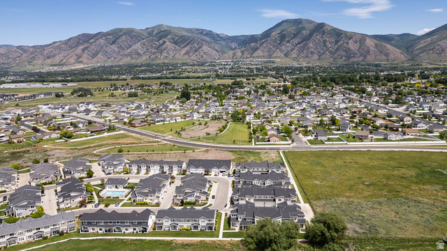 2483 South 1296th Street West Logan, UT 84321 - Photo 33 of 45 Aerial landscape featuring residential communities set against a mountainous backdrop