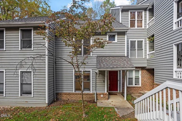 a front view of a house with a porch