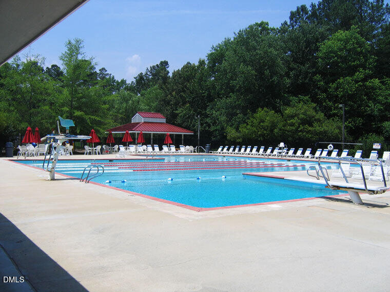 100 Hunting Chase, Unit 1D Cary, NC 27513 - Photo 27 of 33 a view of swimming pool with an outdoor seating