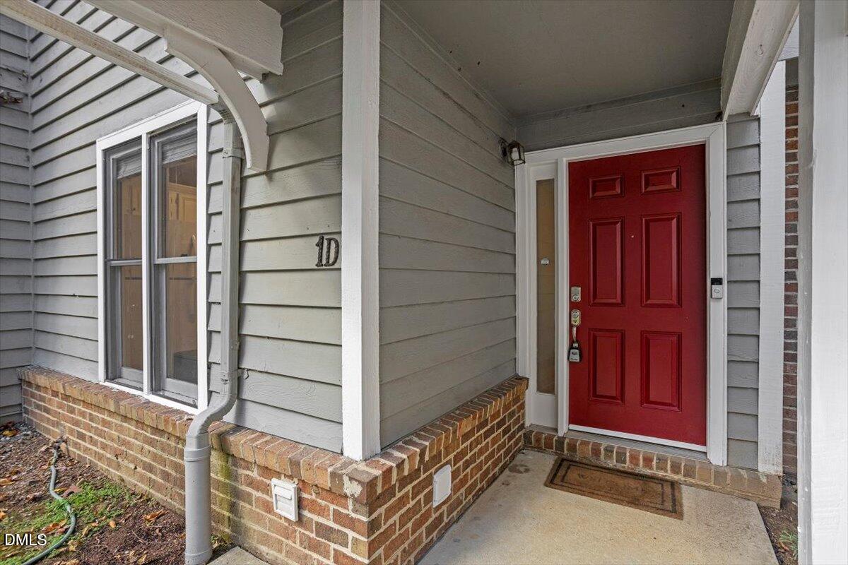 100 Hunting Chase, Unit 1D Cary, NC 27513 - Photo 4 of 33 a view of front door of a house