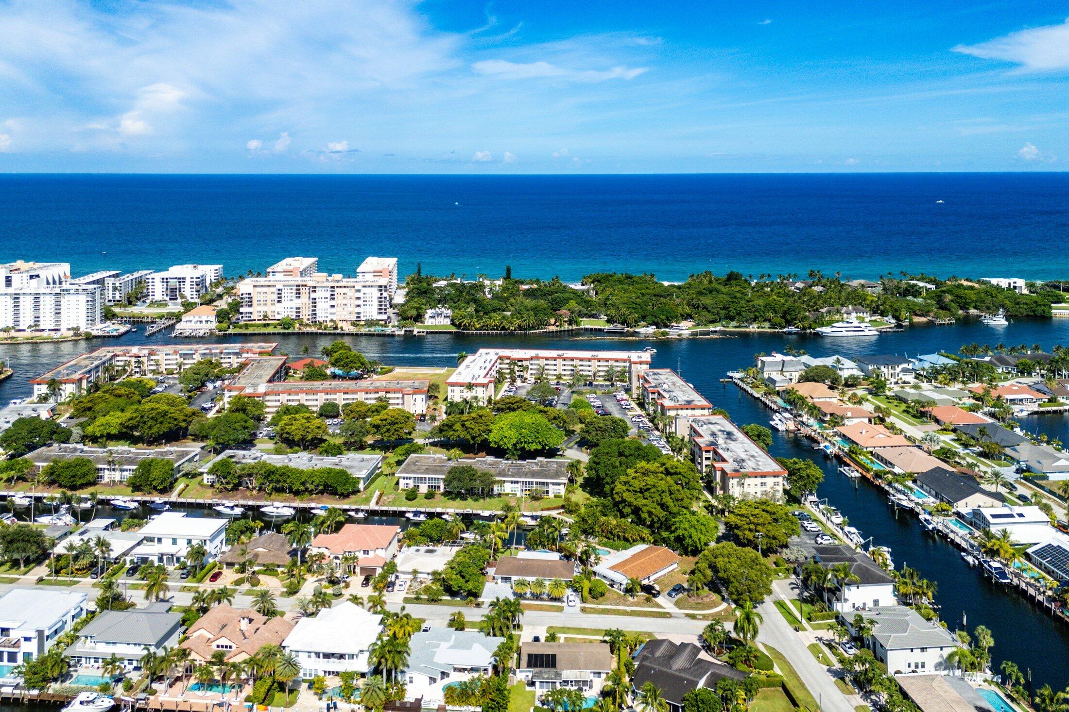 3050 Northeast 48th Court, Unit 402 Lighthouse Point, FL 33064 - Photo 46 of 49 a view of a city with an ocean
