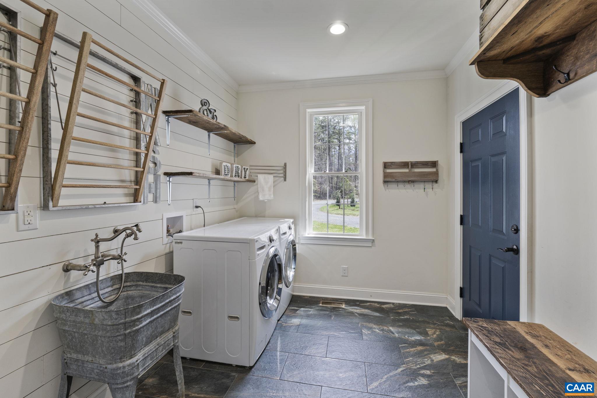 269 Devon Drive Ruckersville, VA 22968 - Photo 25 of 51 a view of a kitchen with furniture and windows