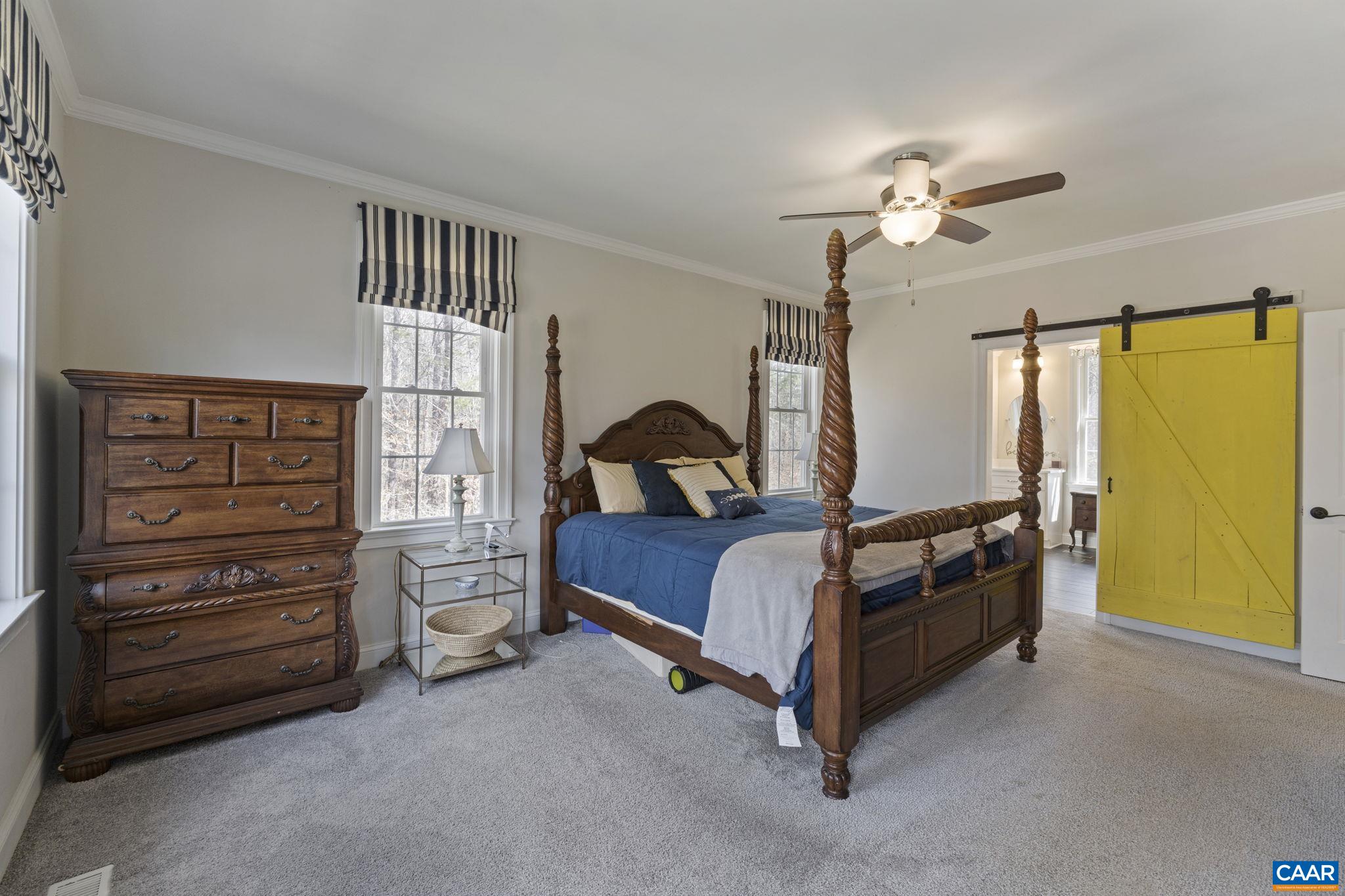269 Devon Drive Ruckersville, VA 22968 - Photo 31 of 51 a bedroom with a bed and a window