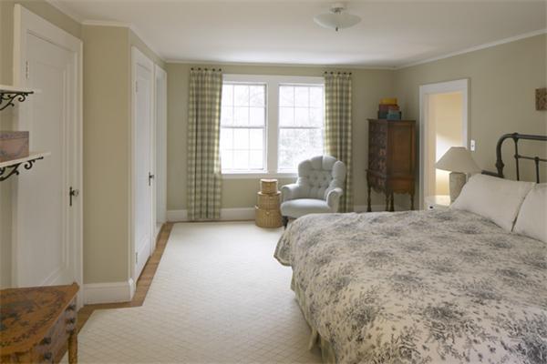 6 Upland Road West Arlington, MA 02474 - Photo 7 of 9 a bed sitting in a bedroom next to a window