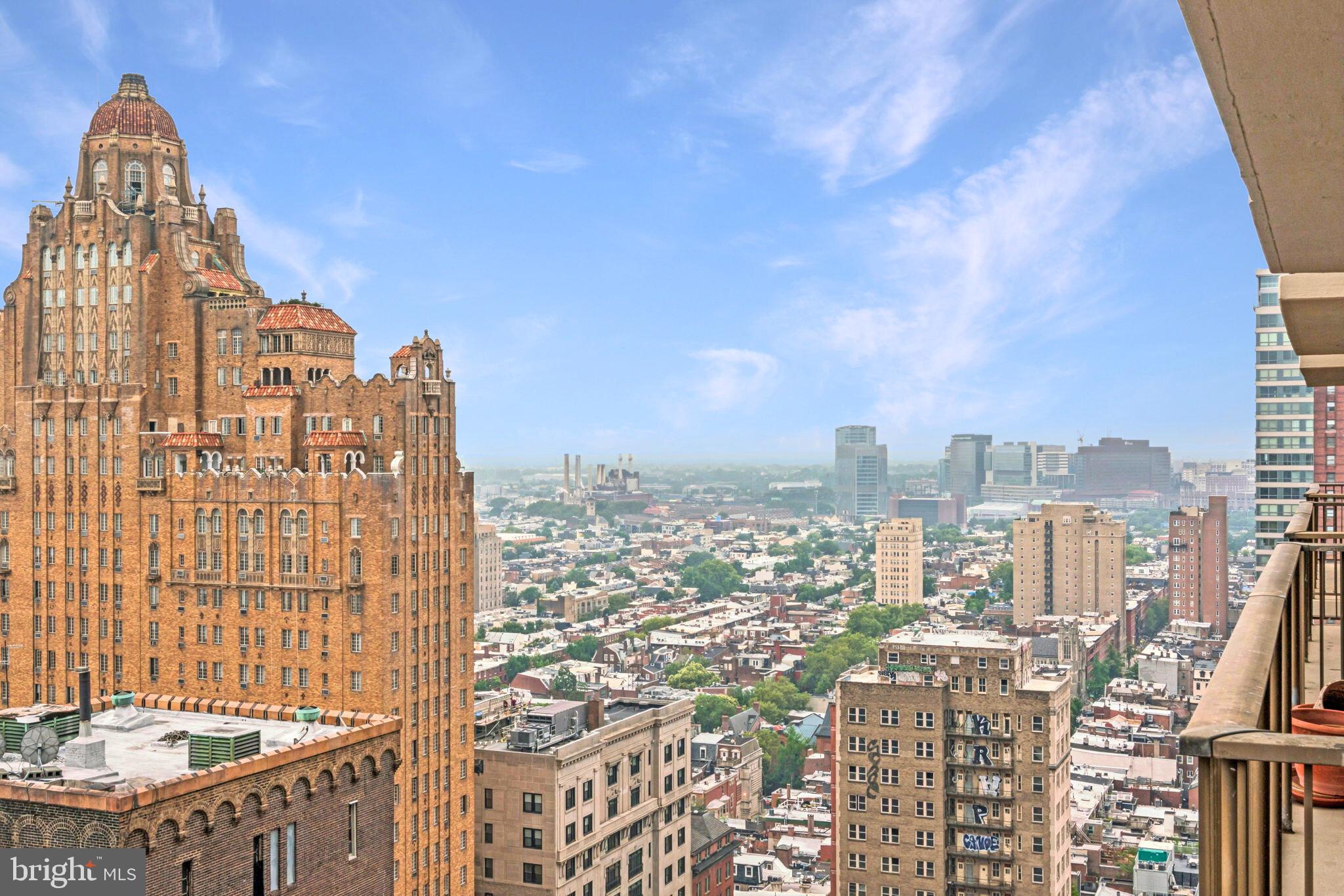 1420 Locust Street, Unit 28P Philadelphia, PA 19102 - Photo 14 of 25 a view of a city with tall buildings