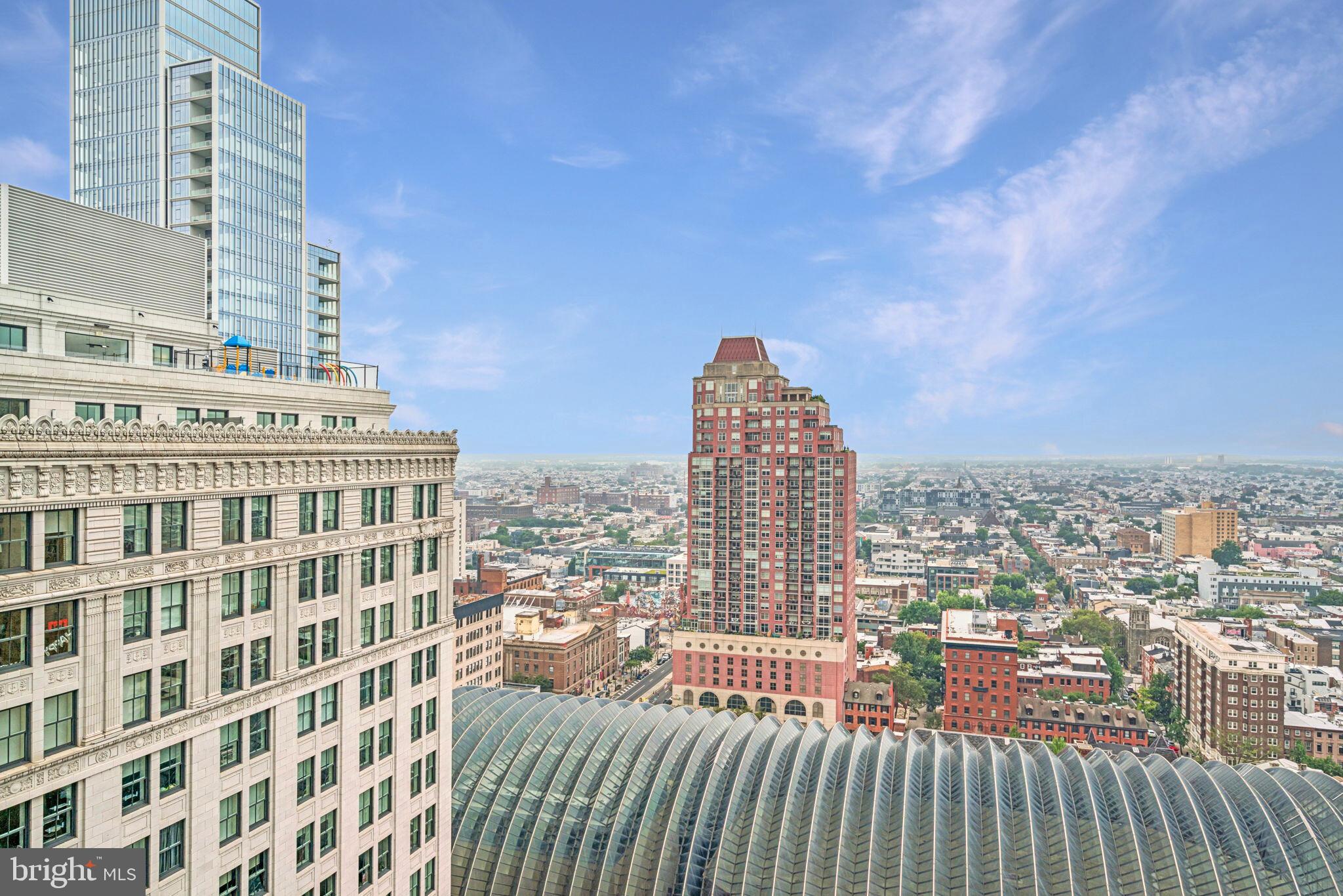1420 Locust Street, Unit 28P Philadelphia, PA 19102 - Photo 15 of 25 a view of a city with tall buildings
