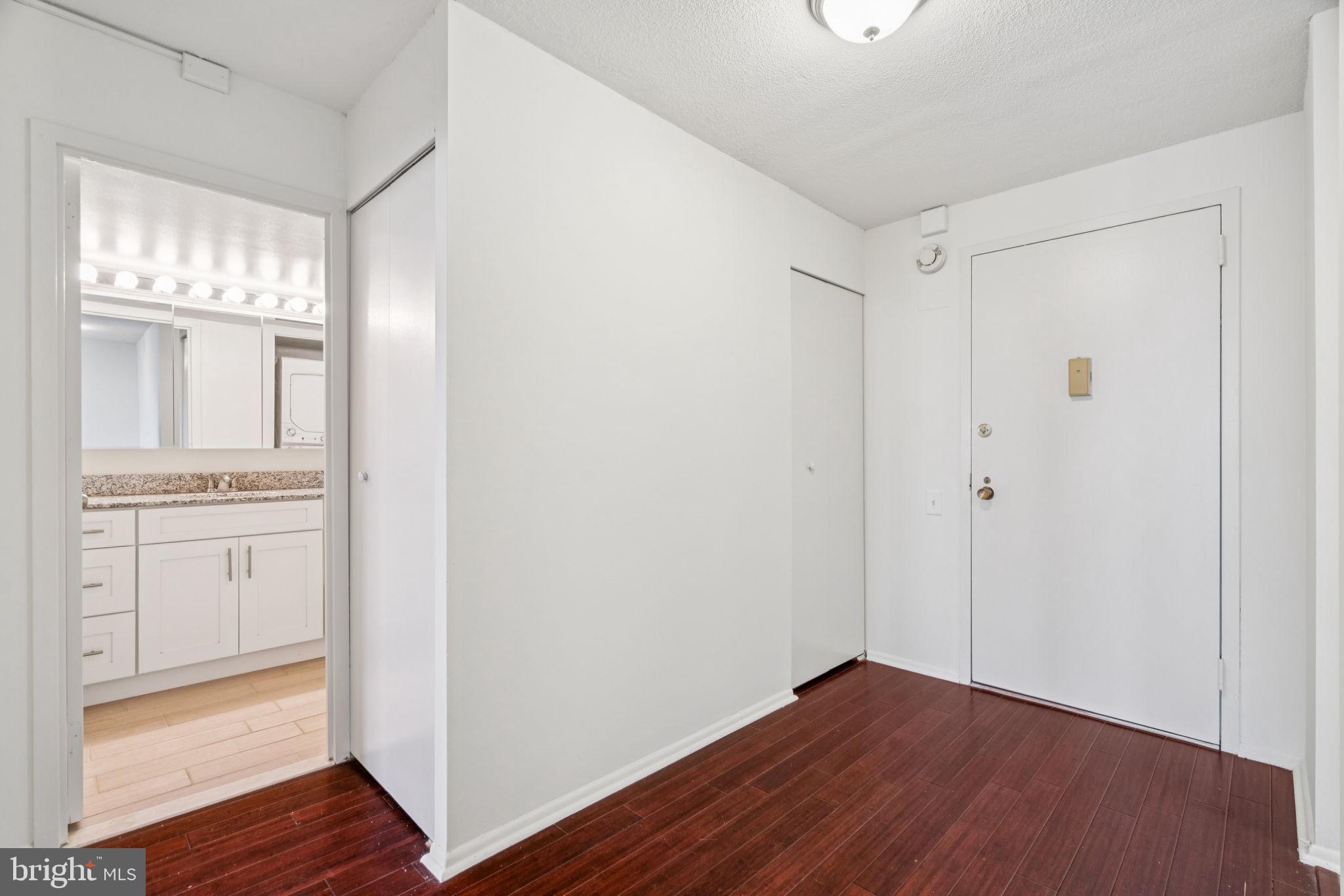 1420 Locust Street, Unit 28P Philadelphia, PA 19102 - Photo 4 of 25 a view of a room with wooden floor and bathroom