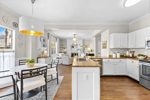 a bathroom with a sink a mirror and a toilet