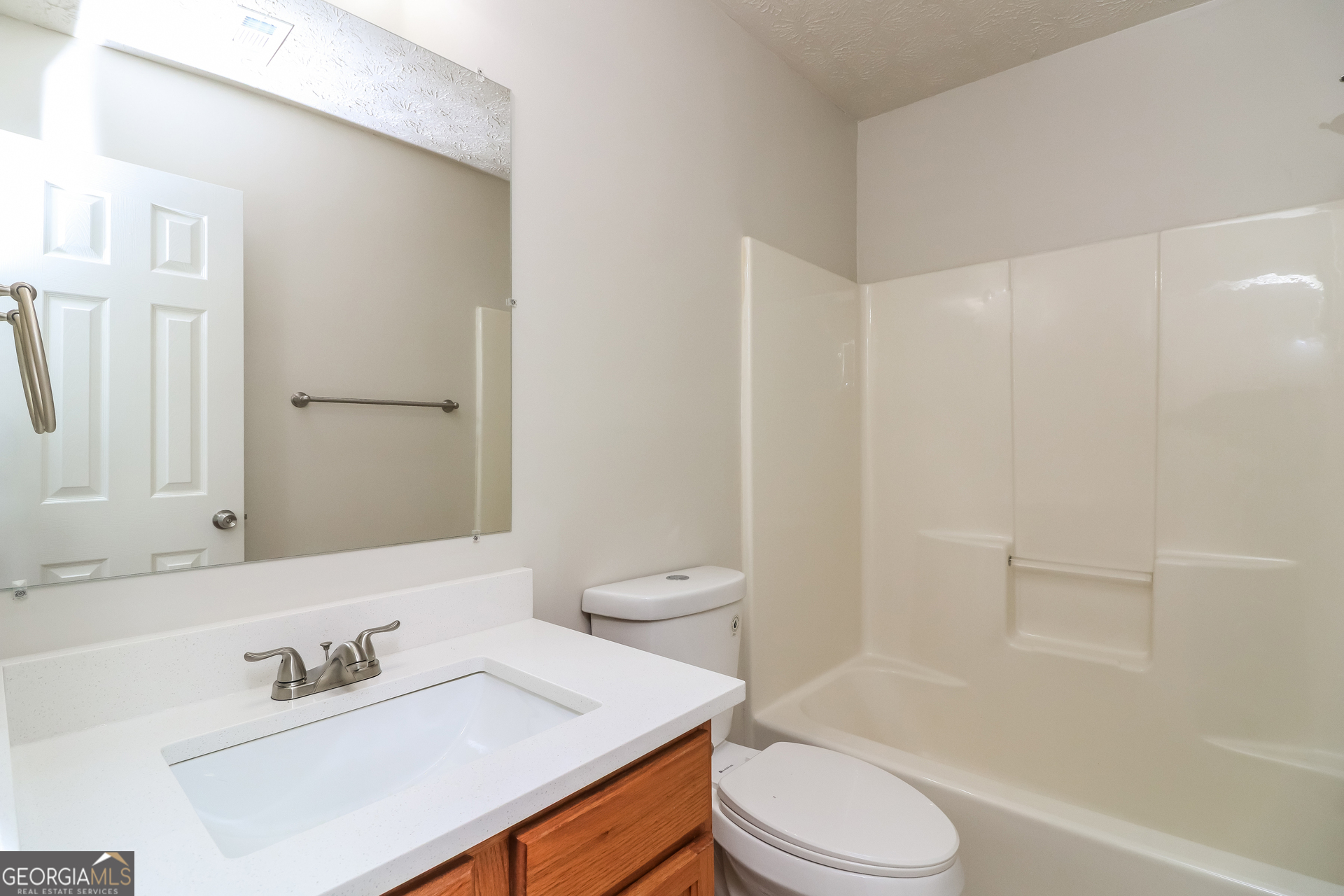 3623 Thurleston Court Southwest Austell, GA 30106 - Photo 12 of 17 a bathroom with a sink toilet tub and shower