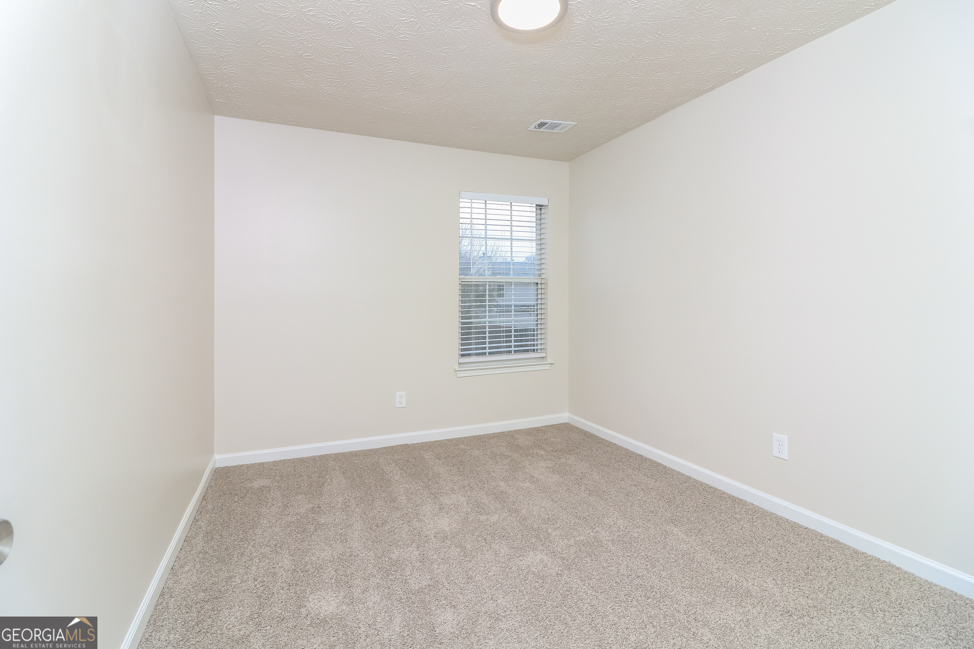 3623 Thurleston Court Southwest Austell, GA 30106 - Photo 13 of 17 a view of an empty room with a window