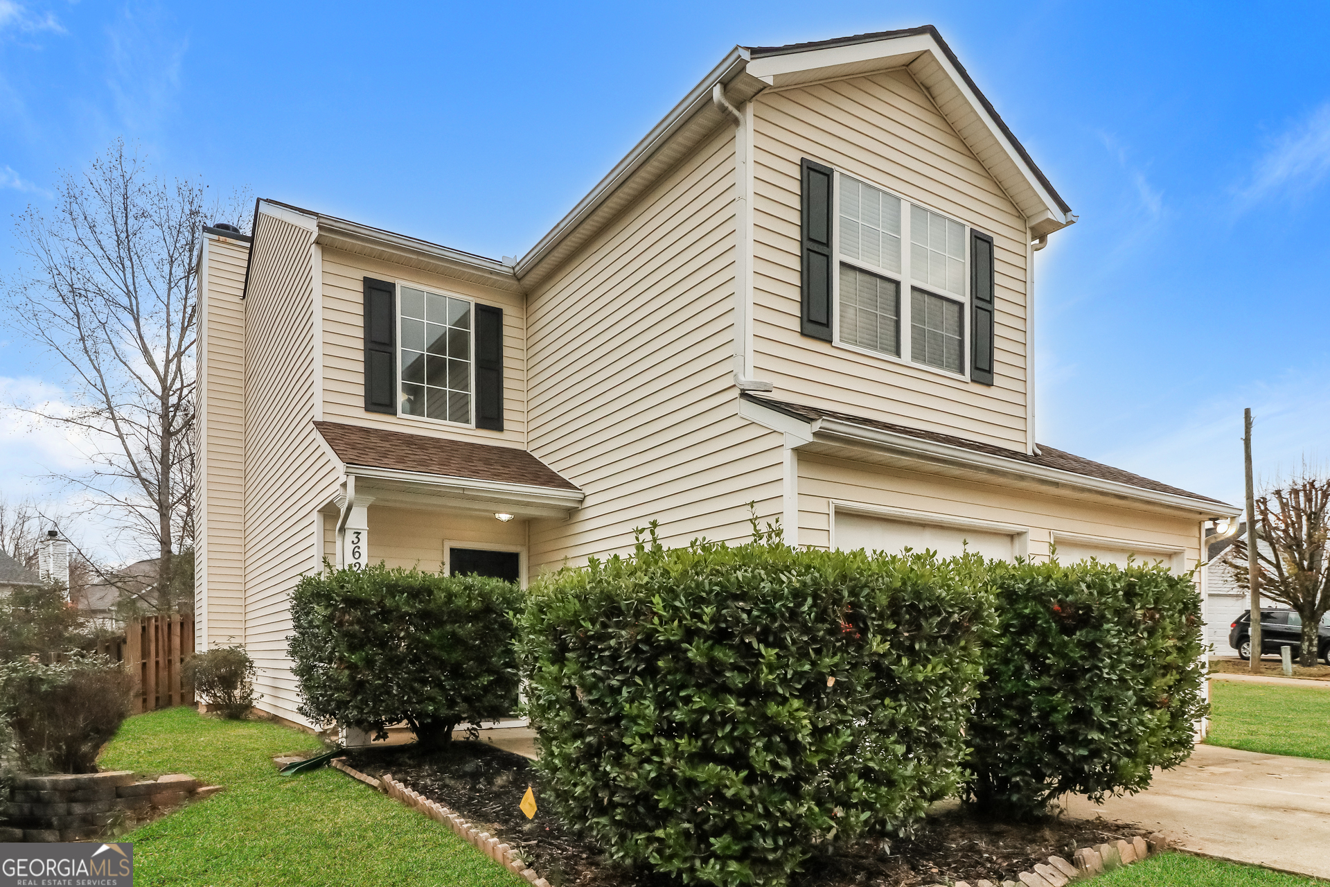 3623 Thurleston Court Southwest Austell, GA 30106 - Photo 2 of 17 a front view of a house with garden