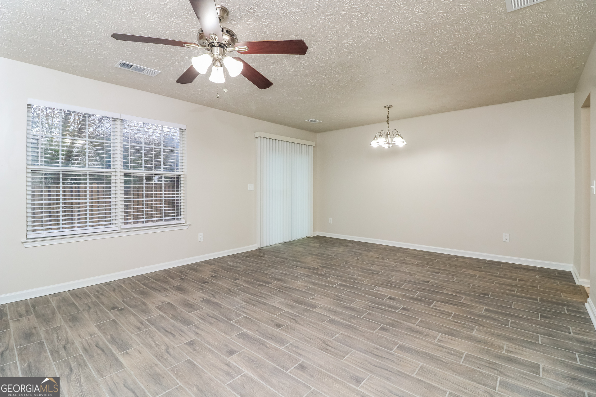 3623 Thurleston Court Southwest Austell, GA 30106 - Photo 3 of 17 a view of empty room with wooden floor