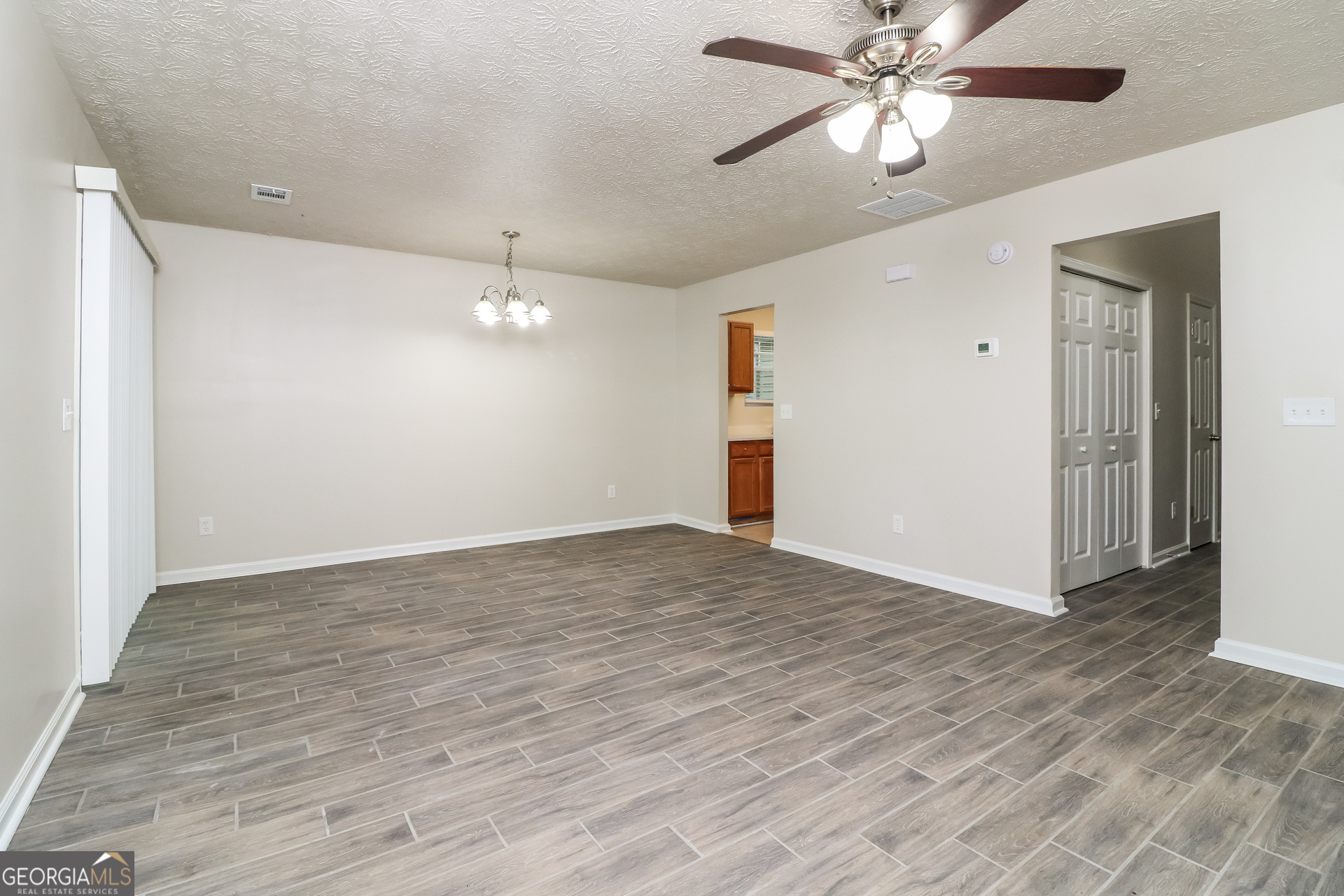 3623 Thurleston Court Southwest Austell, GA 30106 - Photo 4 of 17 a view of empty room with wooden floor