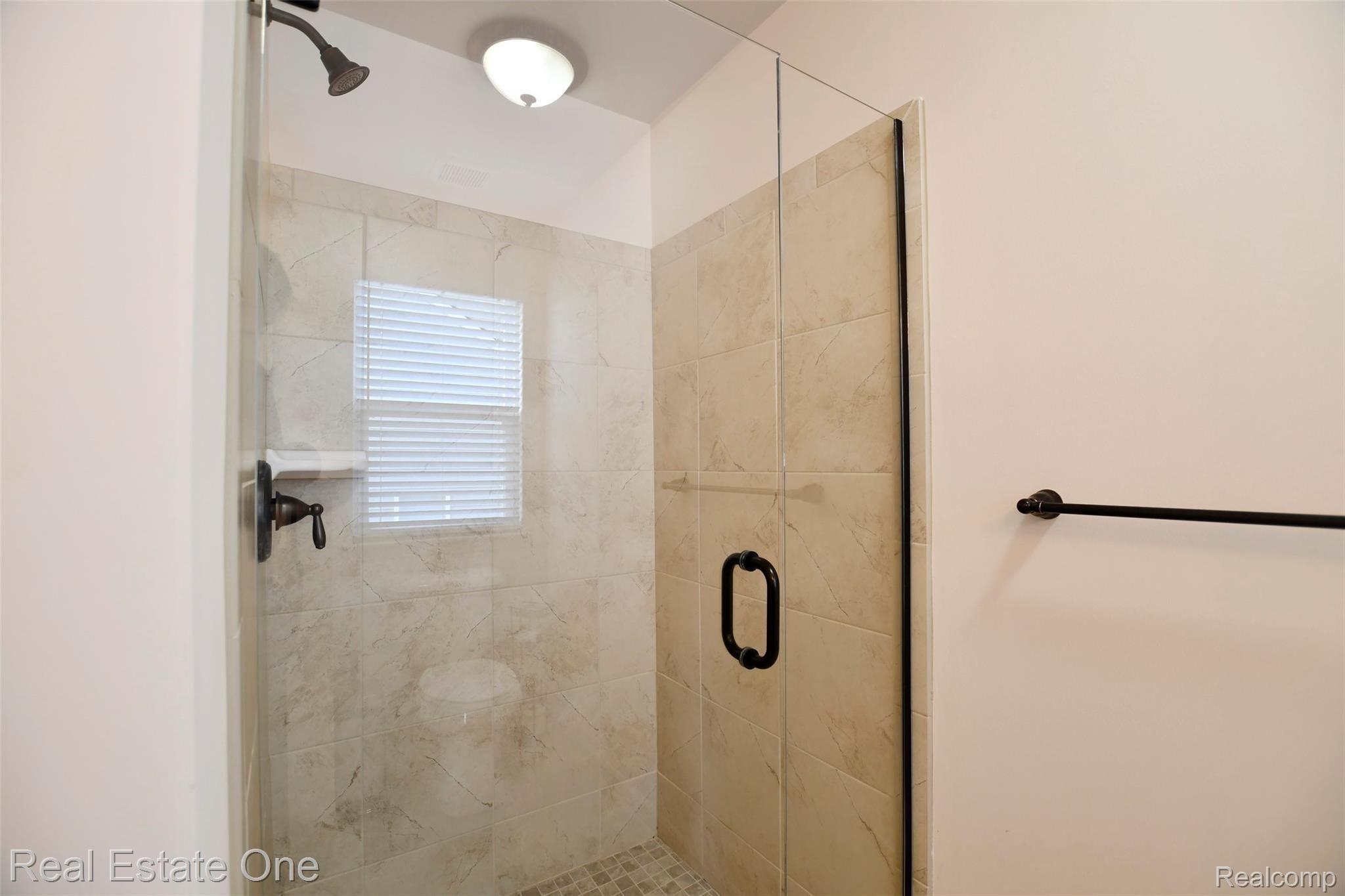 3087 Curtis Road Wixom, MI 48393 - Photo 18 of 36 Master Bathroom Shower.jpg