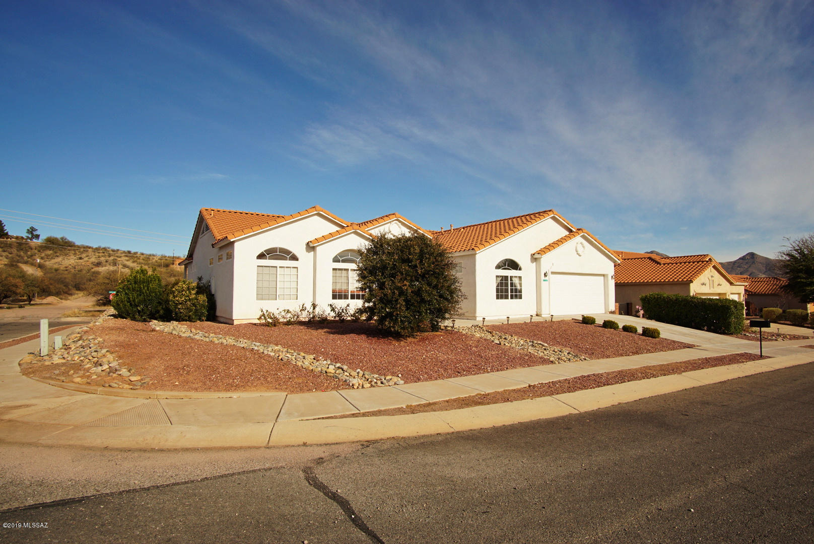 1137 Avenida Seville Rio Rico, AZ 85648 - Photo 2 of 19 a view of spacious house with a yard