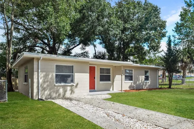 front view of a house with a yard