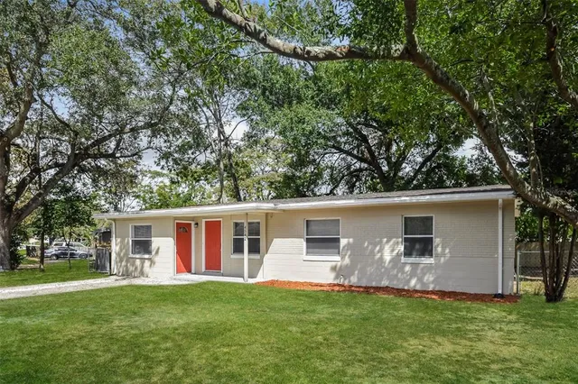 front view of a house with a yard