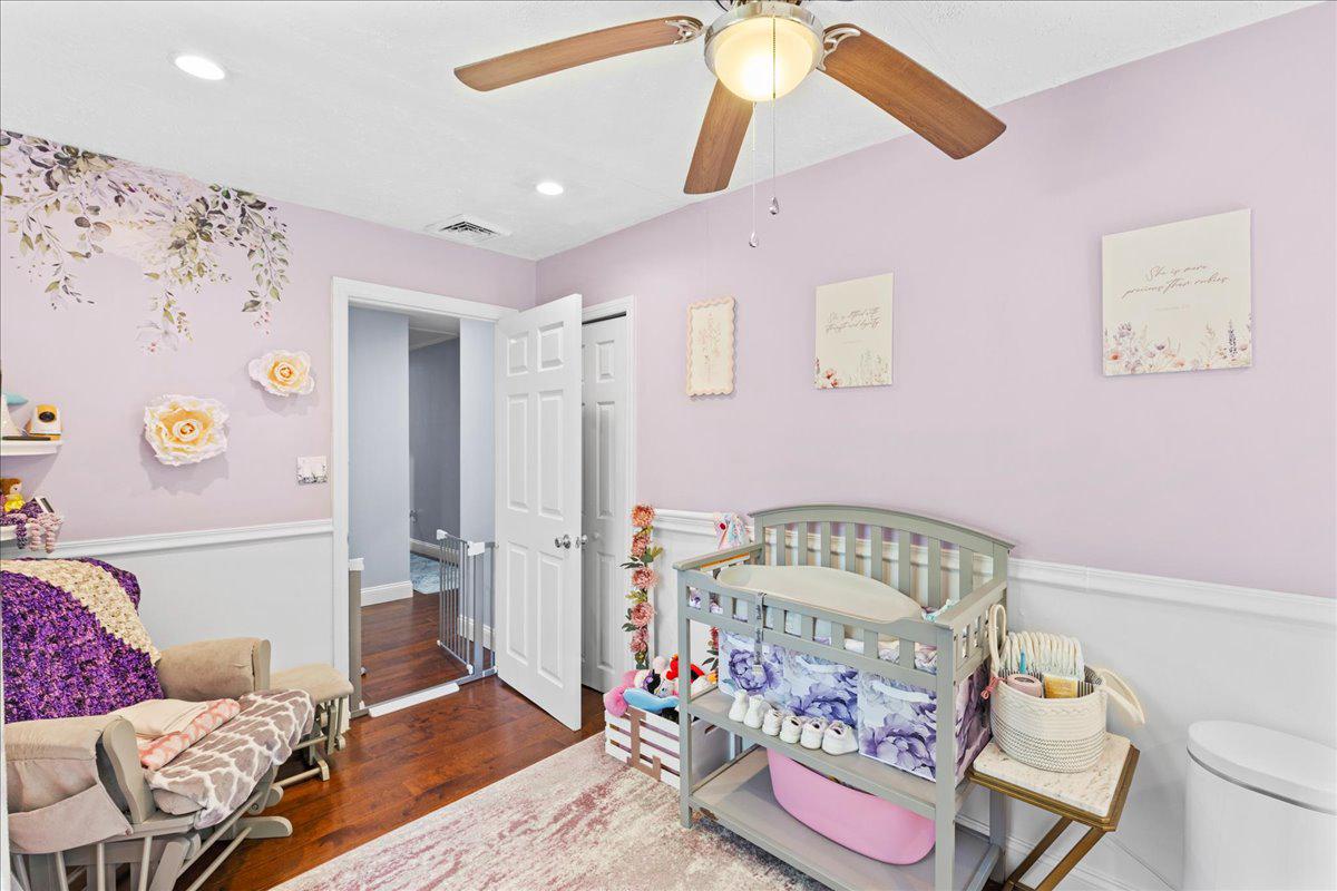 3 Cross Road Pine Hill, NJ 08021 - Photo 14 of 24 a bedroom with furniture and a wooden floor