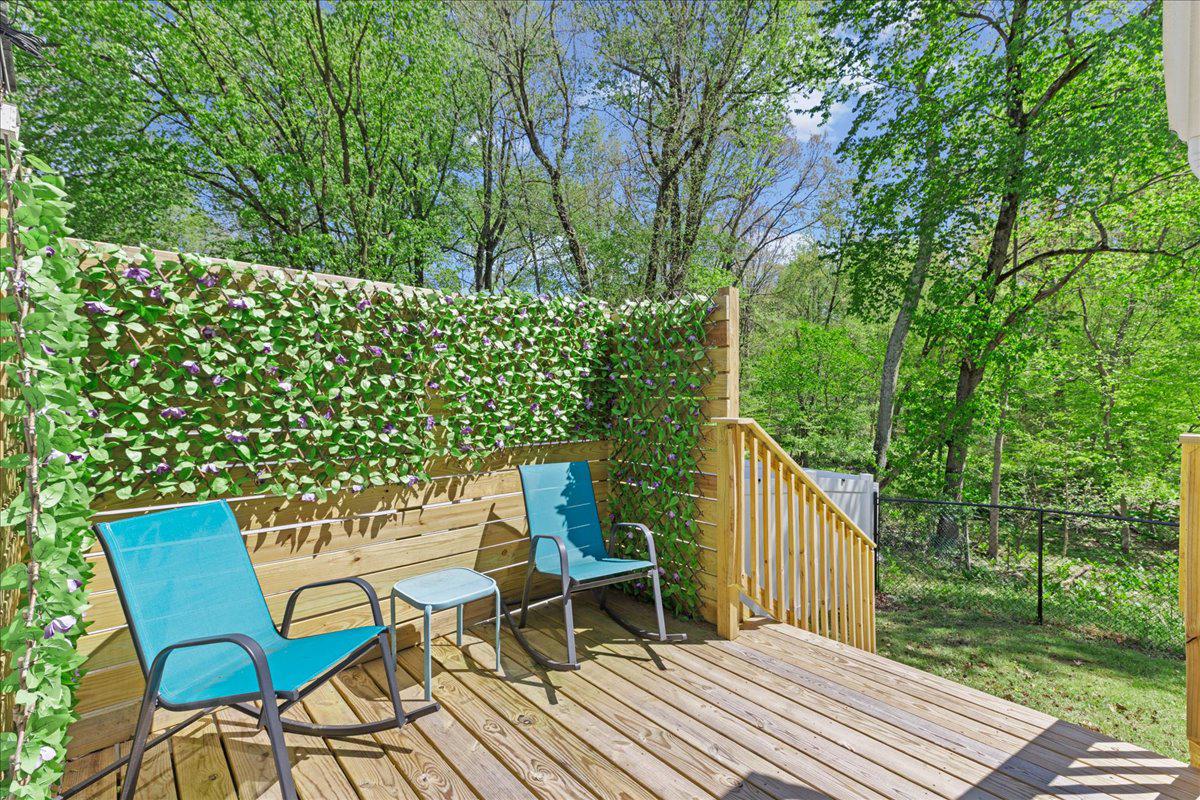 3 Cross Road Pine Hill, NJ 08021 - Photo 3 of 24 a view of a chairs and table on the deck