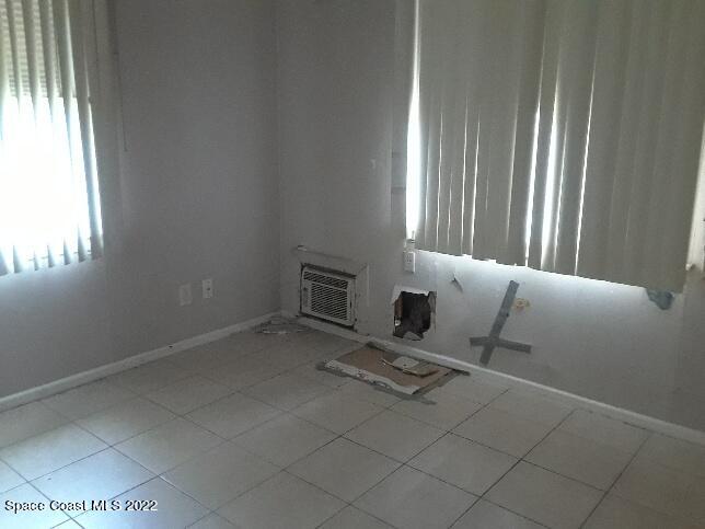 3920 Dixie Highway Northeast Palm Bay, FL 32905 - Photo 25 of 28 a living room with furniture and a window