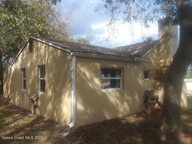 3920 Dixie Highway Northeast Palm Bay, FL 32905 - Photo 3 of 28 a picture of a glass door