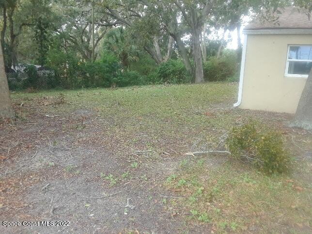 3920 Dixie Highway Northeast Palm Bay, FL 32905 - Photo 5 of 28 a view of a field with trees in the background