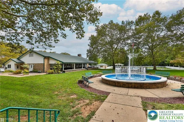 a table and chairs in a garden
