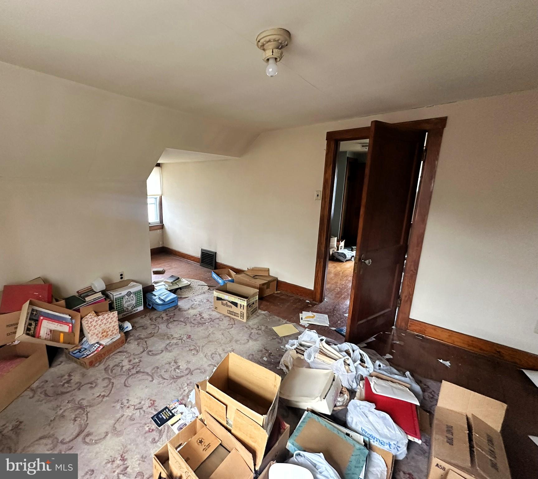 919 York Street Hanover, PA 17331 - Photo 21 of 24 a bedroom with furniture and a mirror