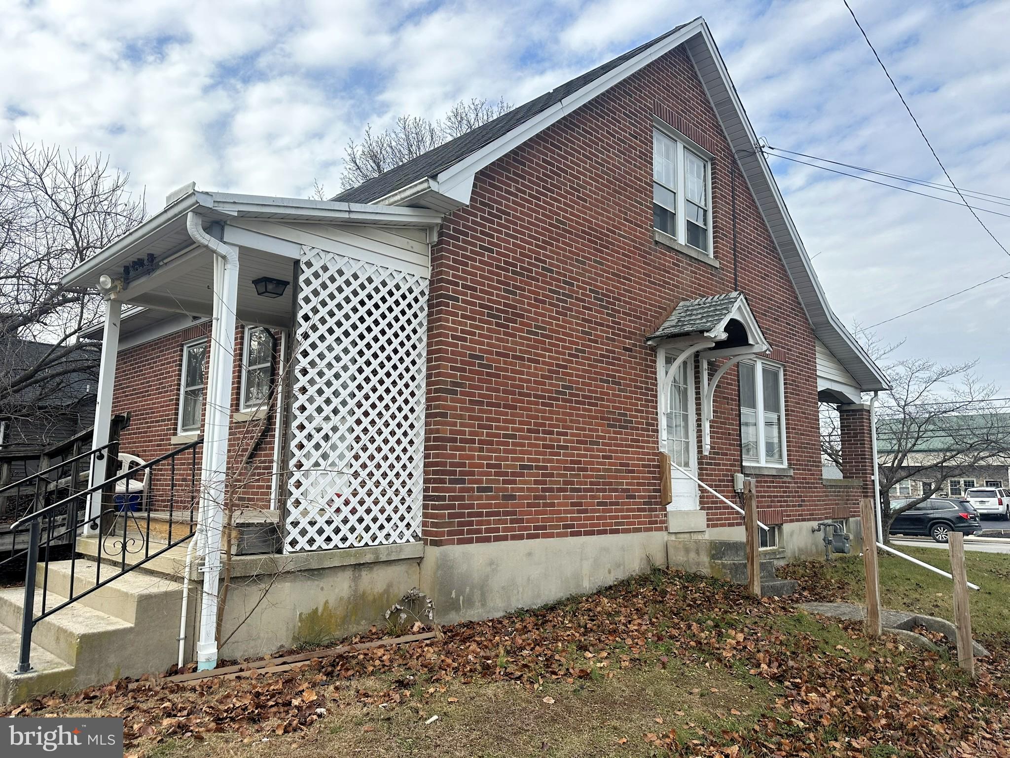 919 York Street Hanover, PA 17331 - Photo 5 of 24 a front view of a house with a yard
