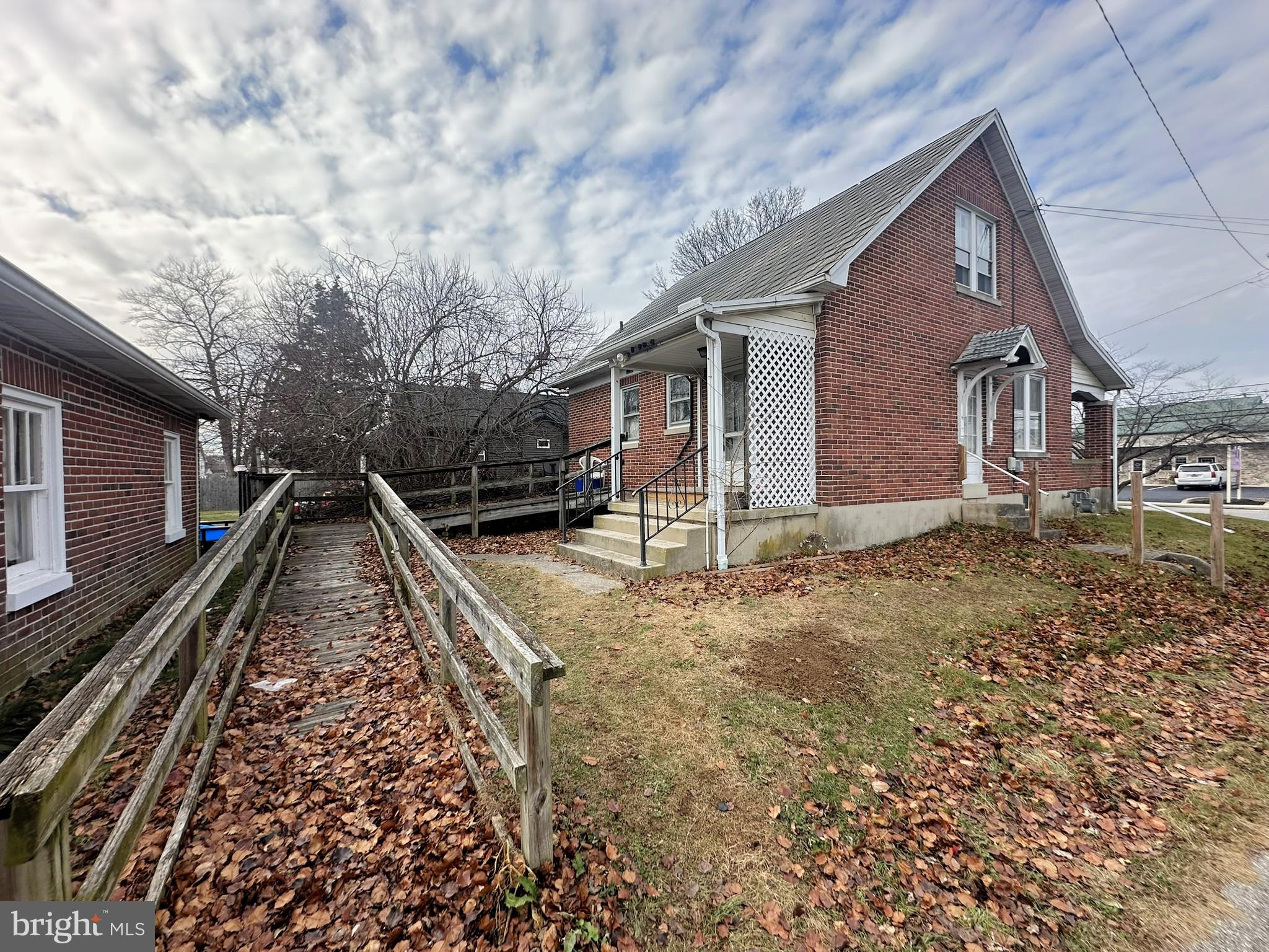 919 York Street Hanover, PA 17331 - Photo 8 of 24 a front view of a house with a yard