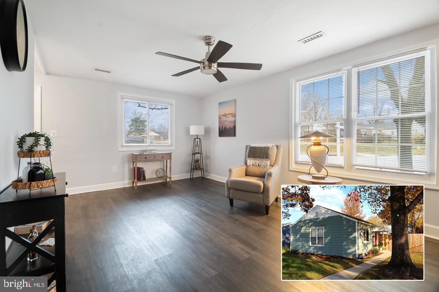 1613 Kimber Road Glen Burnie, MD 21060 - Photo 1 of 39 a living room with furniture and a floor to ceiling window