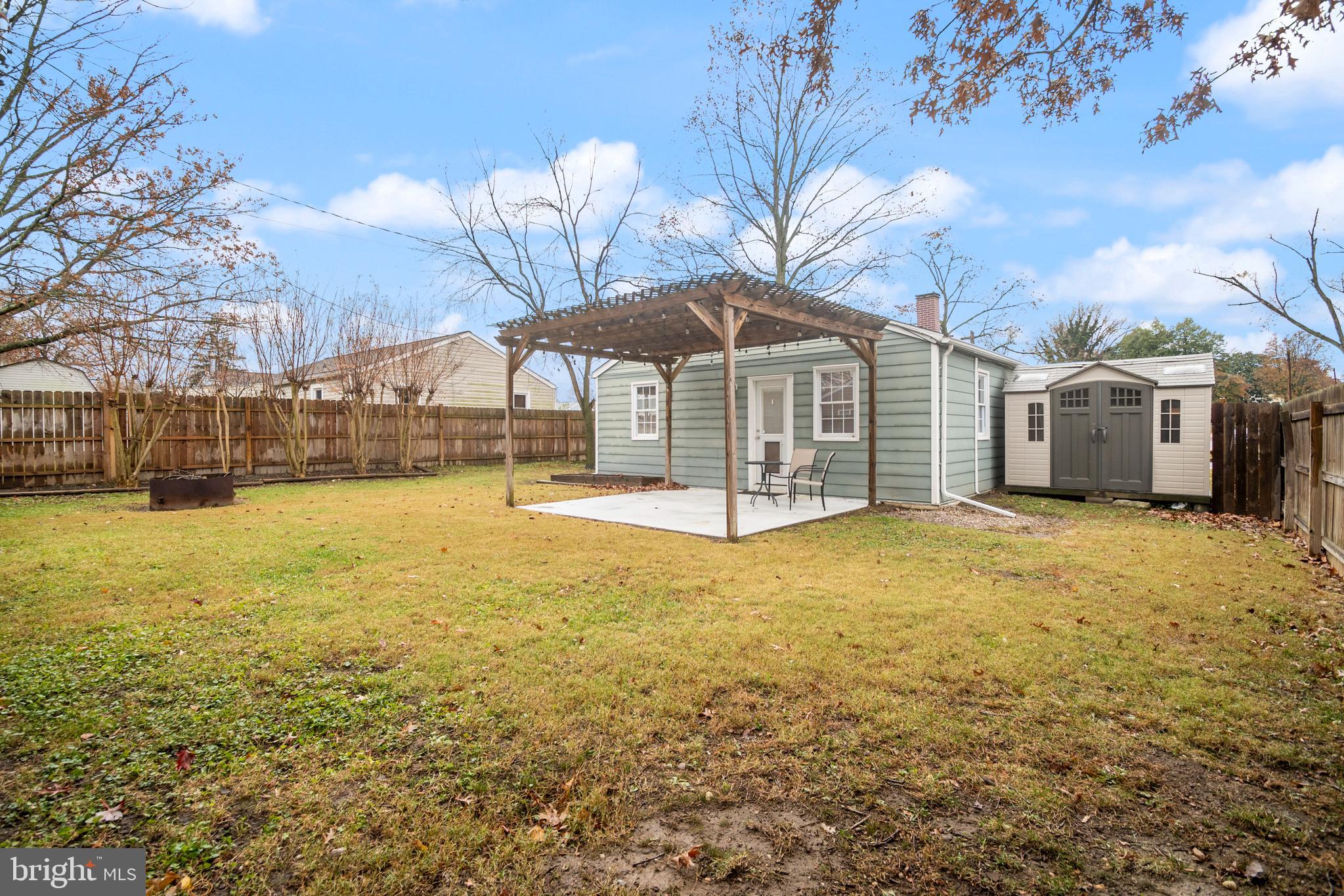 1613 Kimber Road Glen Burnie, MD 21060 - Photo 24 of 39 a view of a house with a yard