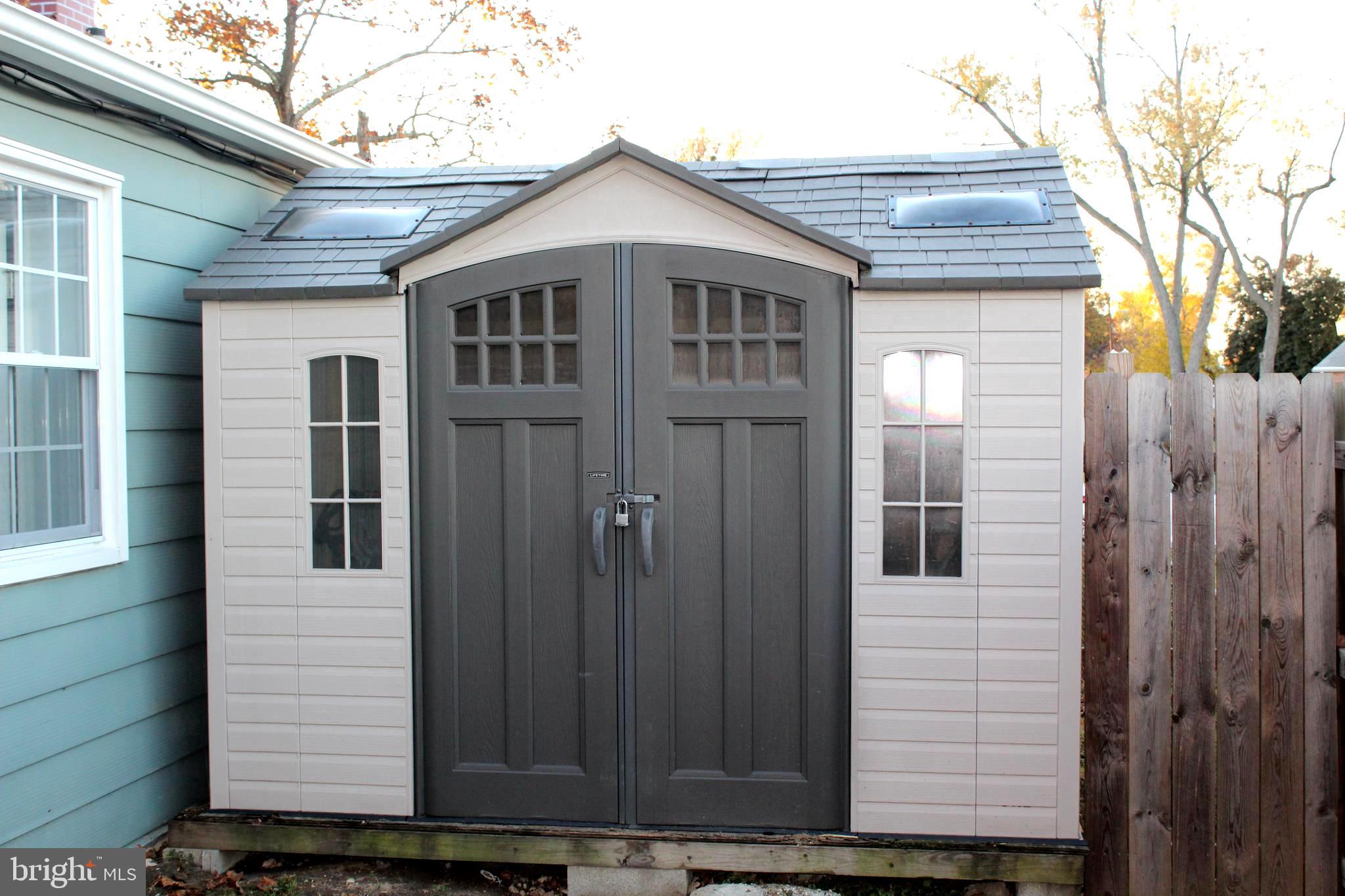1613 Kimber Road Glen Burnie, MD 21060 - Photo 36 of 39 a front view of a house with a yard