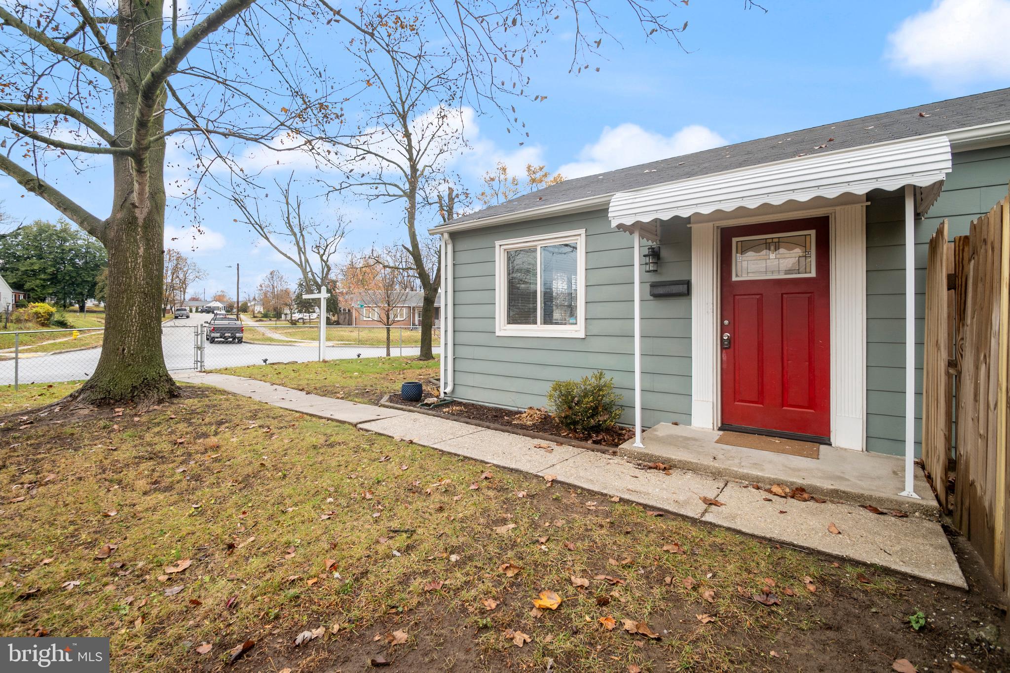 1613 Kimber Road Glen Burnie, MD 21060 - Photo 39 of 39 a front view of a house with a yard