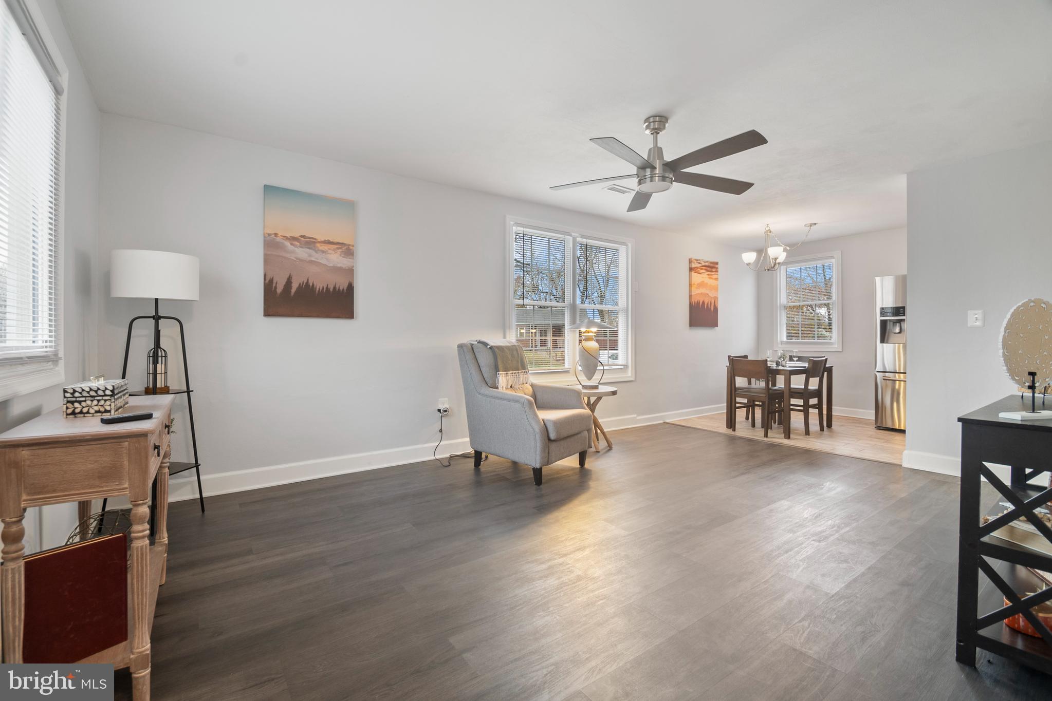 1613 Kimber Road Glen Burnie, MD 21060 - Photo 6 of 39 a living room with furniture and a table