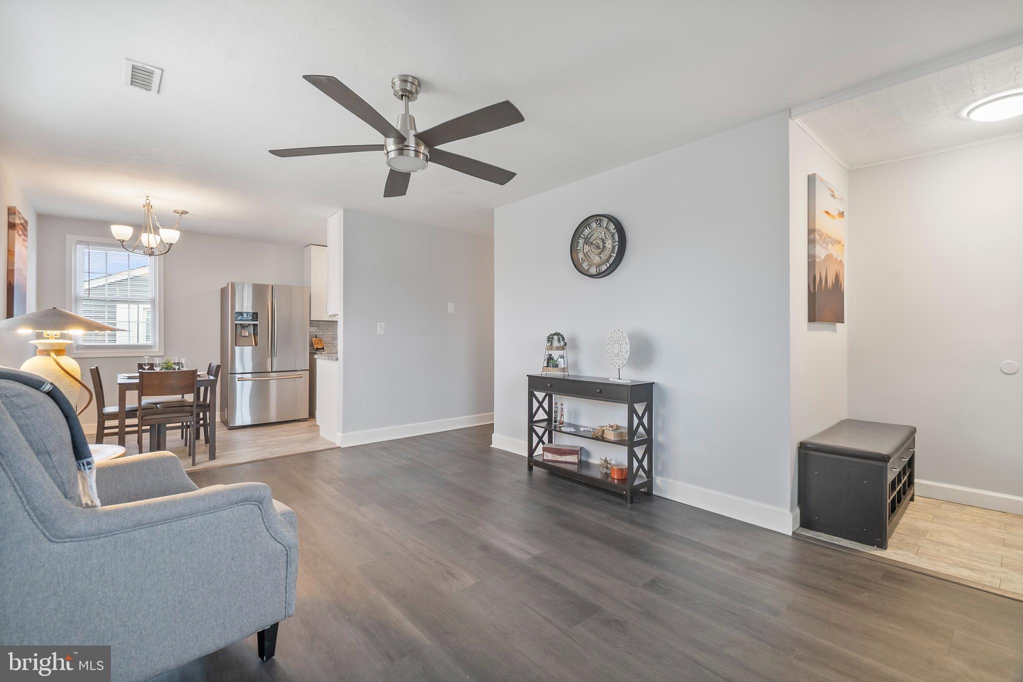 1613 Kimber Road Glen Burnie, MD 21060 - Photo 8 of 39 a living room with furniture and a wooden floor