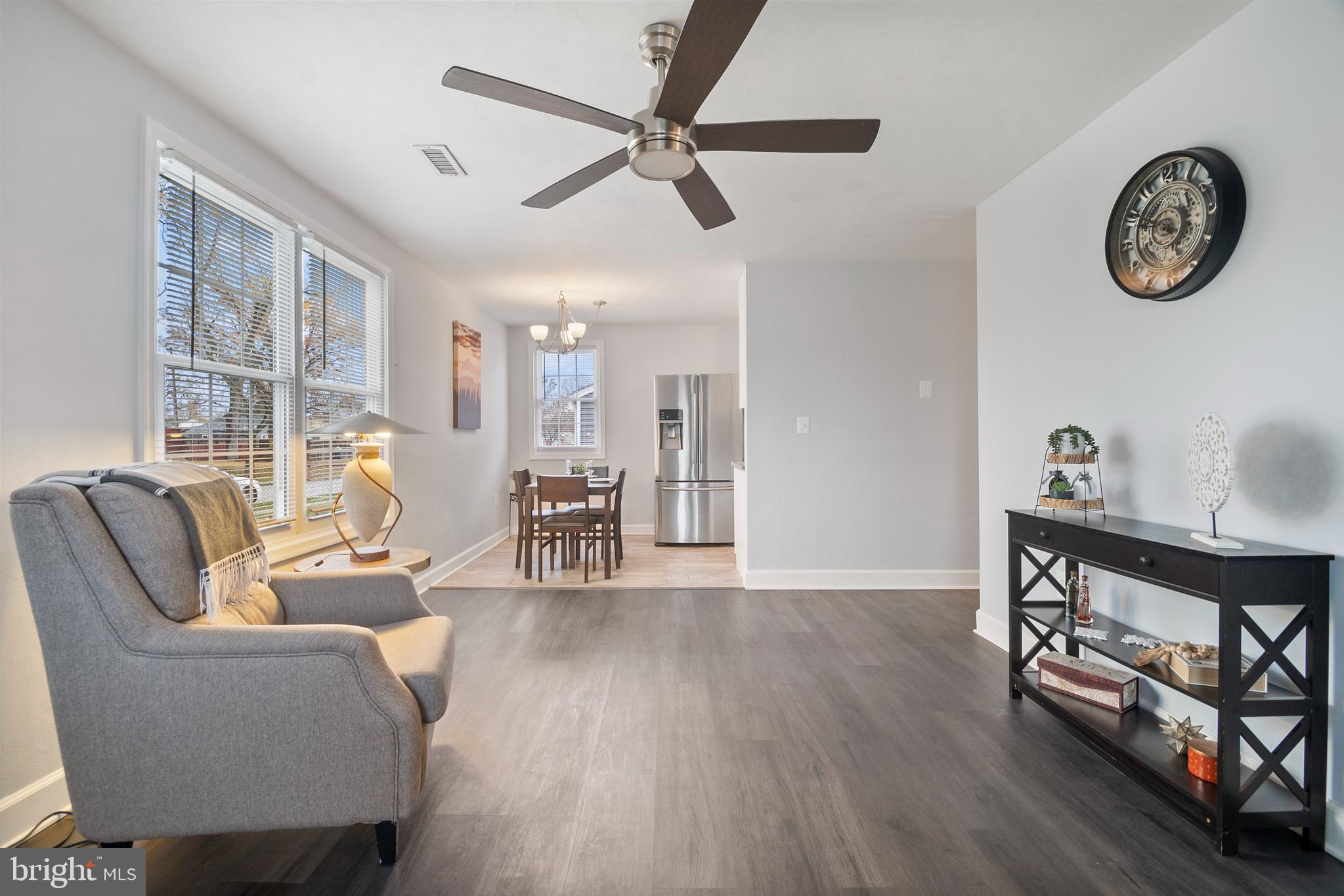 1613 Kimber Road Glen Burnie, MD 21060 - Photo 9 of 39 a living room with furniture and a wooden floor