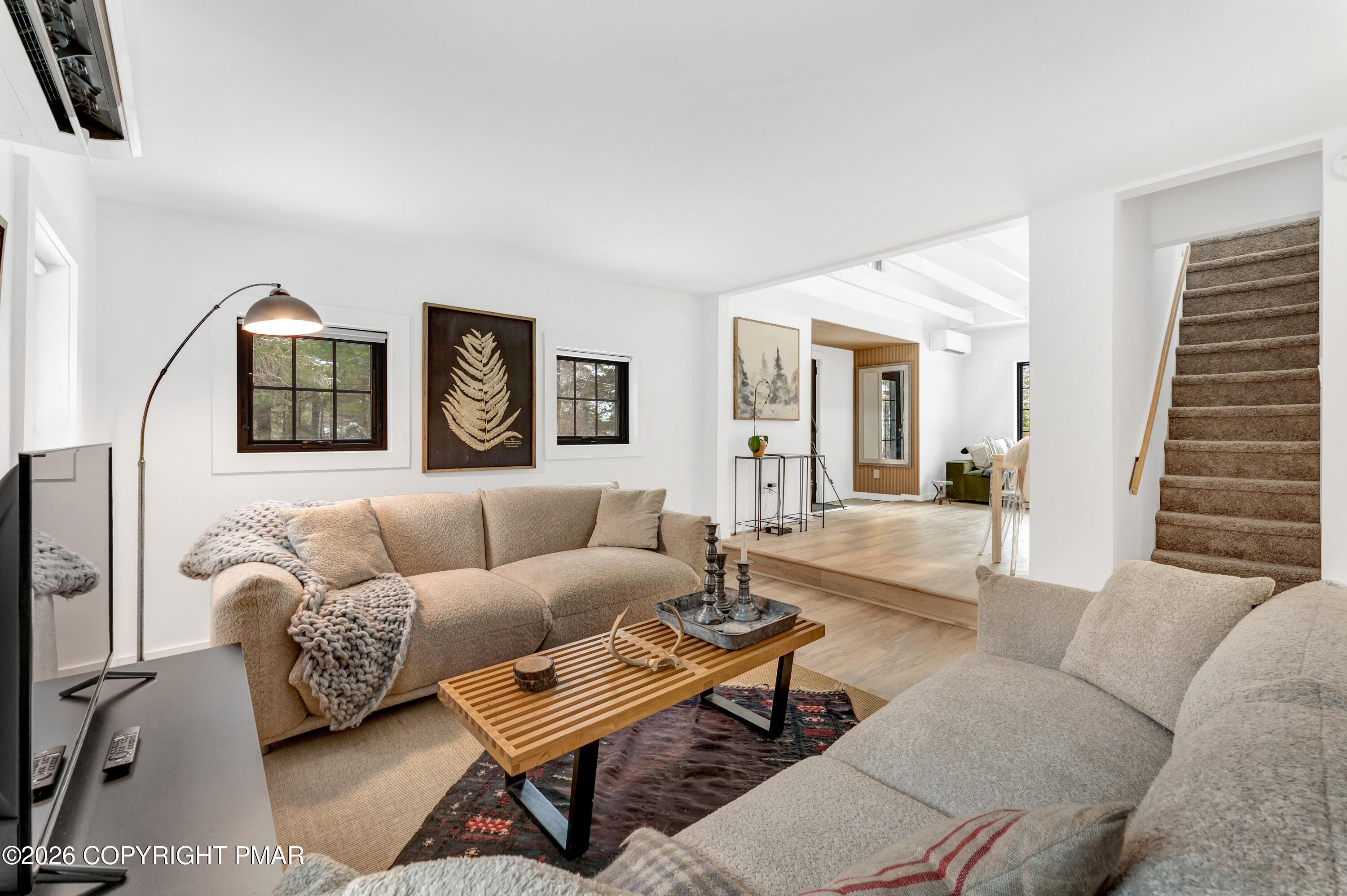 353 German Hill Road Shohola, PA 18458 - Photo 4 of 35 a living room with furniture and a wooden floor