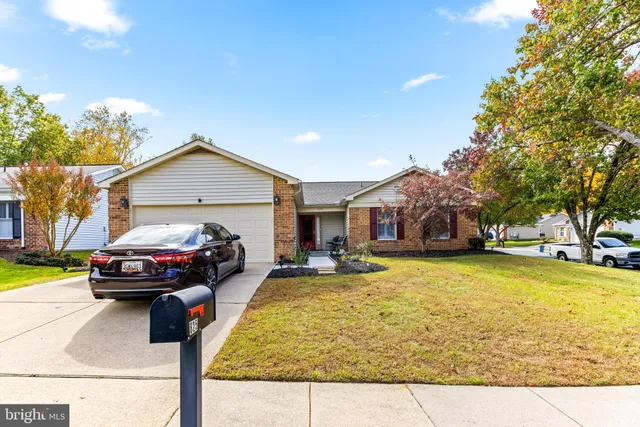 a car parked in front of a house