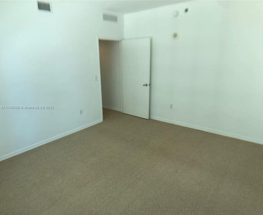 950 Brickell Bay Drive, Unit 602 Miami, FL 33131 - Photo 13 of 20 a view of an empty room