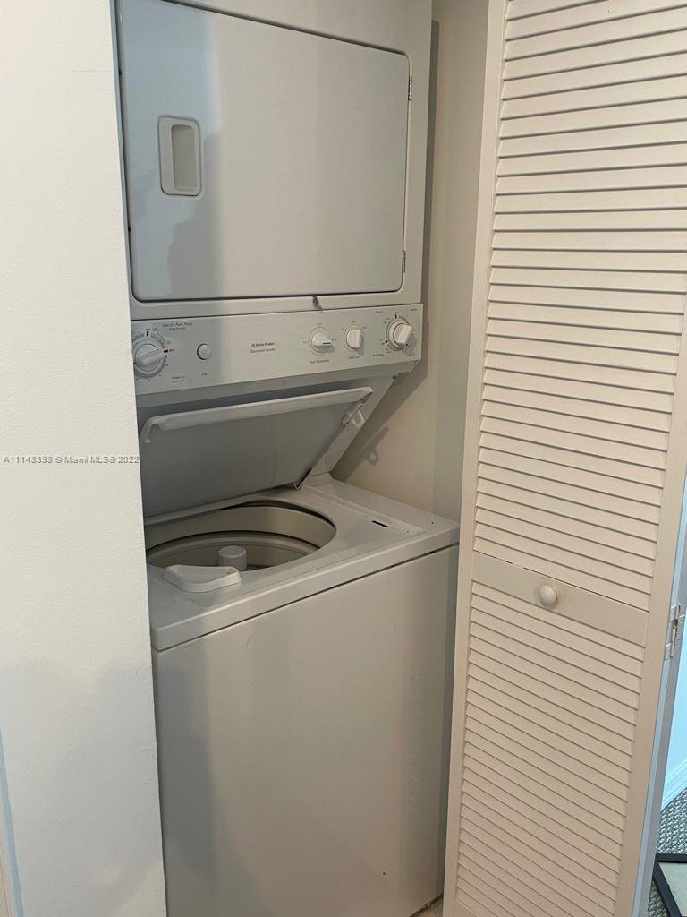 950 Brickell Bay Drive, Unit 602 Miami, FL 33131 - Photo 17 of 20 a close up view of washer and dryer