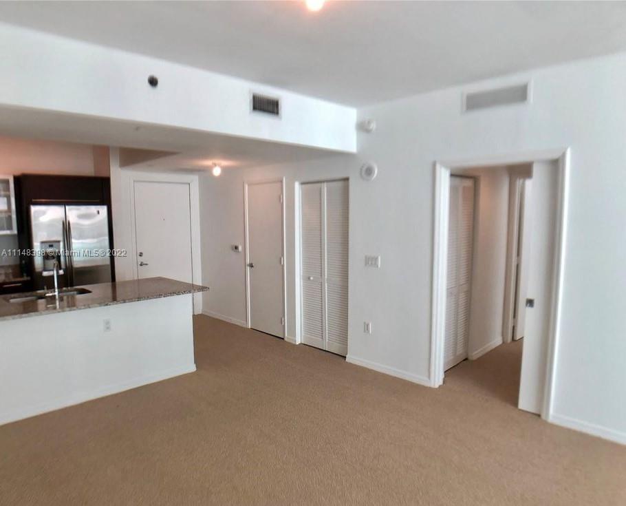 950 Brickell Bay Drive, Unit 602 Miami, FL 33131 - Photo 8 of 20 a view of an empty room